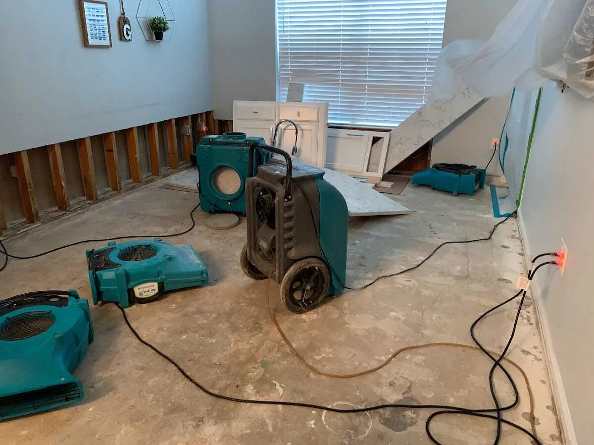 Dehumidifier in flood-cut room for Water Damage Restoration in Forest City